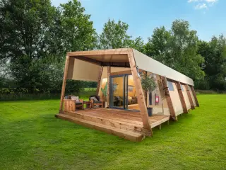 Nature Lodge: wood-and-canvas glamping tent with a terrace, on the grass
