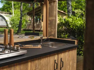 Luxury Suite: kitchenette with a cooktop and a sink