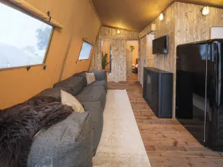 Nature Lodge: the interior lengthwise, from the living area to the kitchen