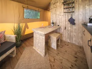 Wood Lodge Cozy: wooden table with a bench by the window